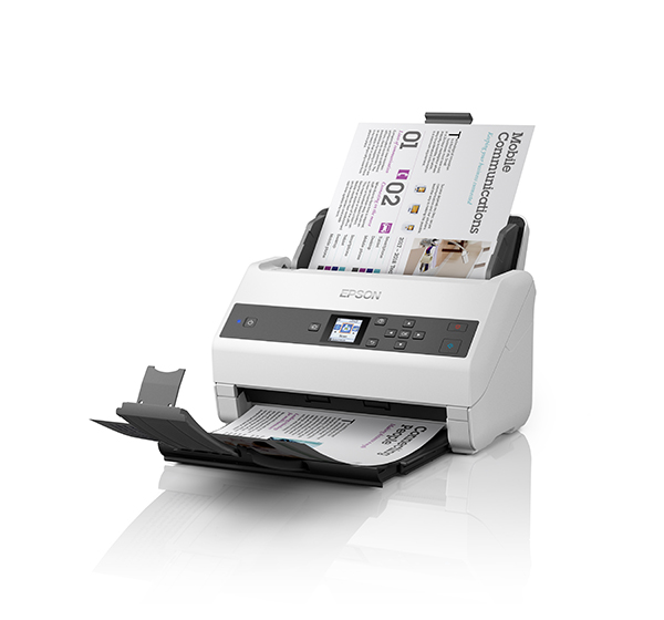 A document sits in the feeder tray of an Epson WorkForce DS-870 document scanner with plain white background