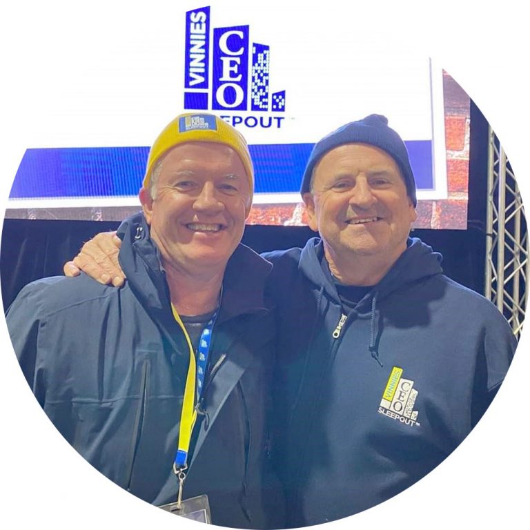 Alan Thompson and Colin Wheeler smiling side-by-side at Vinnies CEO Sleepout Gold Coast