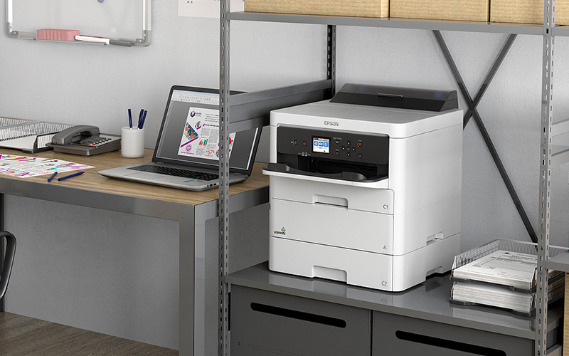 From Paper Jam to Cyber Jam: How Your Office Printer Became a Network Security Risk EPson Inkjet A4 printer sits on shelf in warehouse