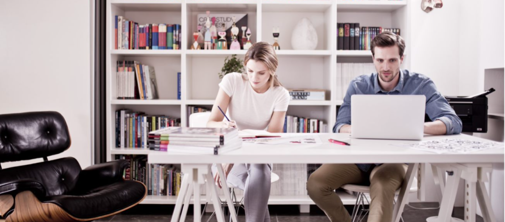 10 Signs Your Business Needs to Invest in a Multifunction Printer Home Office with Multifunctional Printer Image